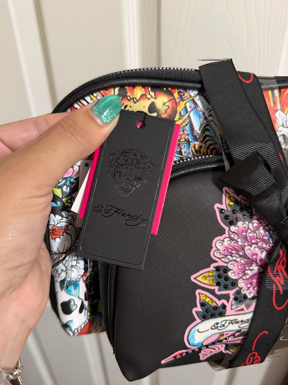 Ed Hardy Black Crossbody Bag with Pink Floral Embellishments
